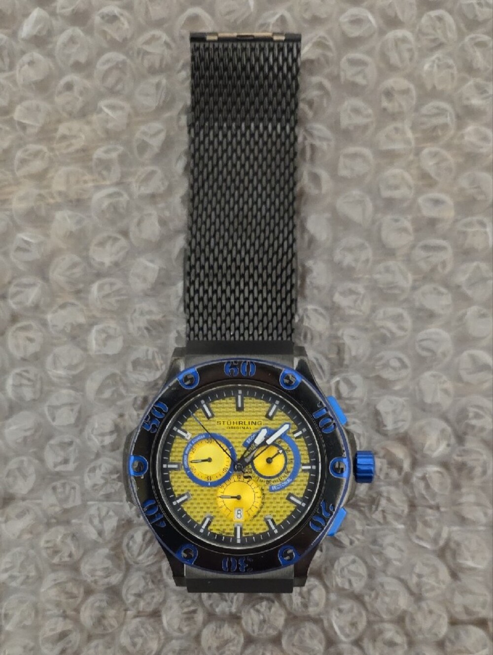 Stuhrling Original Yellow Dial Watch with Blue Accents and Black Mesh Strap